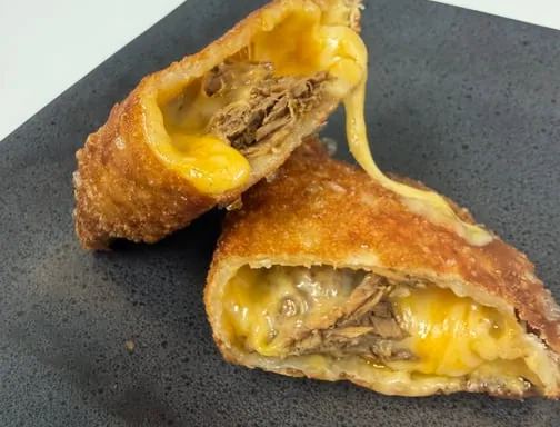 Birria w cheese empanada